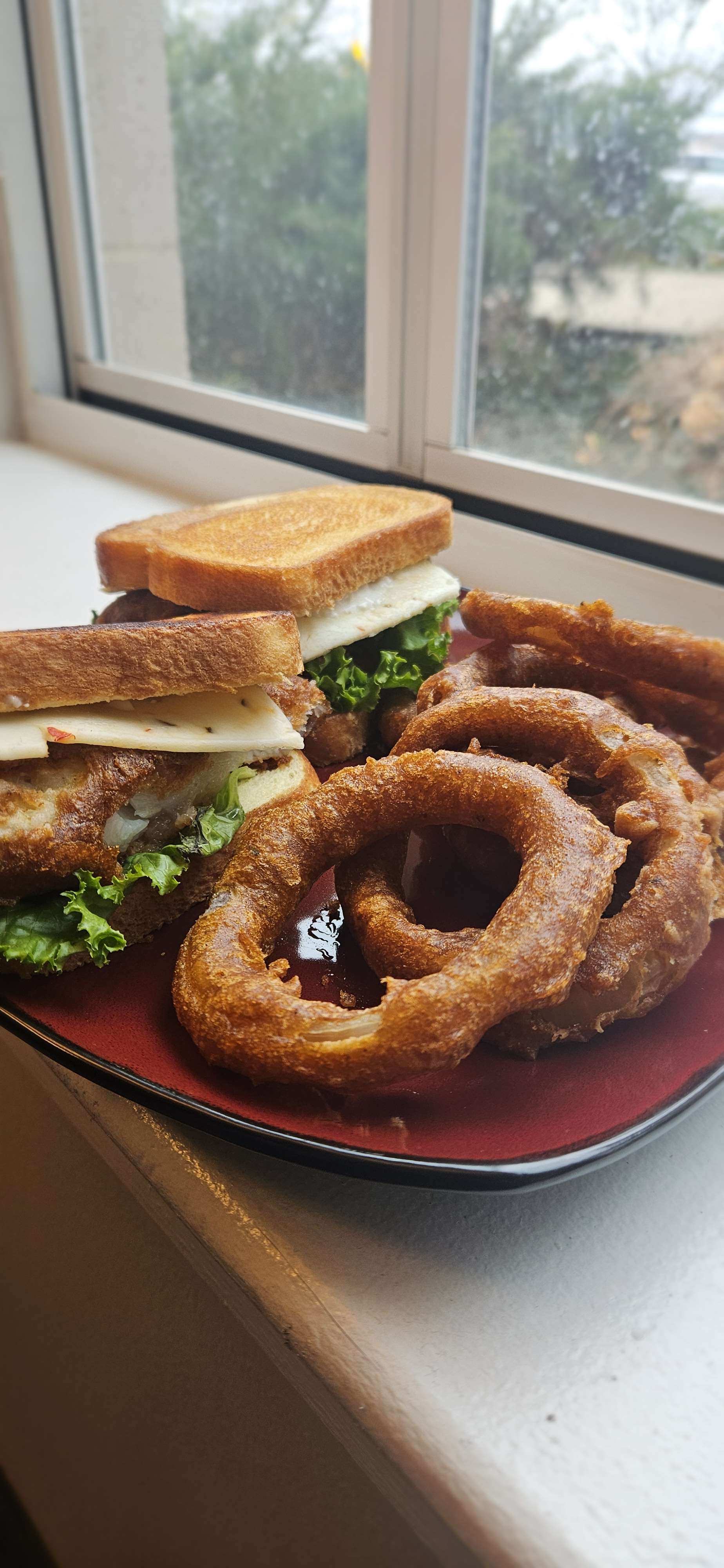 Crispy Beer Batter Cod Sandwich with Onion Rings